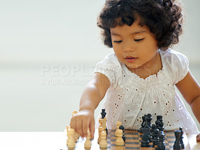 Buy stock photo Girl, child and chess play for learning growth, childhood development or thinking challenge. Female person, board game and table problem solving intelligence or kids, planning knowledge or education