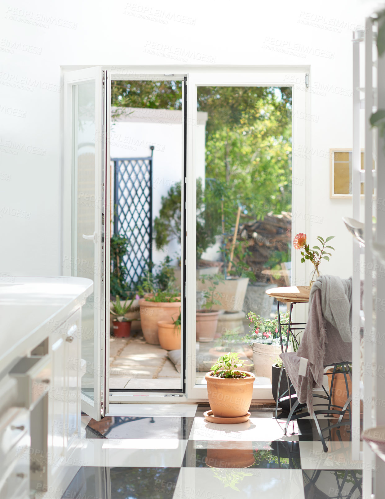 Buy stock photo Shot of a sliding door leading out to a yard