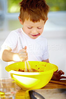 Buy stock photo Boy, bowl or whip in baking, nutrition or playful activity as growth, development or milestone. Male child, naughty or mixing of food, ingredients or meal prep as sweet, dessert or snack in kitchen