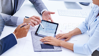 Buy stock photo Shot of businesspeople's hands around a digital tablet in a meeting