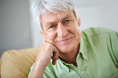 Buy stock photo Smile, relax and portrait of senior man on sofa in home with confidence, wellness and retirement. Happy, calm and old person on couch in living room with pride, peace and weekend morning in apartment