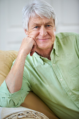 Buy stock photo Smile, relax and portrait of old man in home on sofa with confidence, wellness and retirement. Happy, calm and senior person on couch in living room with pride, peace and weekend morning in apartment