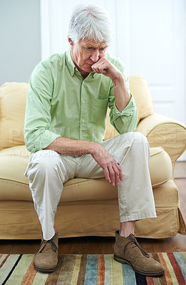 Buy stock photo Senior man, sad and memory on sofa for ideas, choice or thinking for perspective in nursing home. Elderly person, reflection and remember with nostalgia, wonder or insight for decision in living room