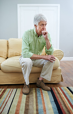 Buy stock photo Senior man, thinking and memory on couch with ideas, reflection or choice with perspective in retirement. Elderly person, sad and remember for nostalgia, wonder or insight for decision in house