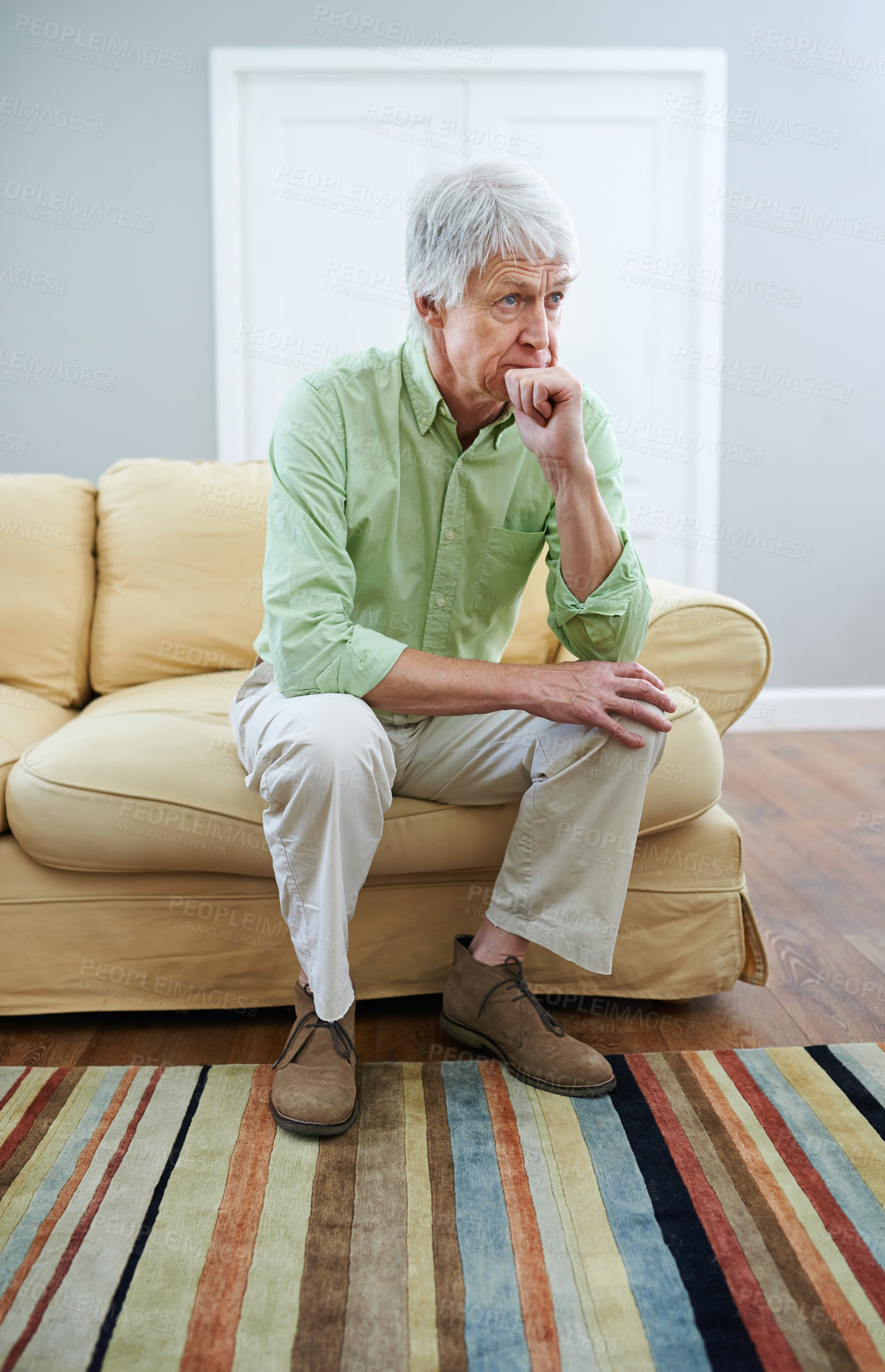 Buy stock photo Senior man, thinking and memory on couch with ideas, reflection or choice with perspective in retirement. Elderly person, sad and remember for nostalgia, wonder or insight for decision in house