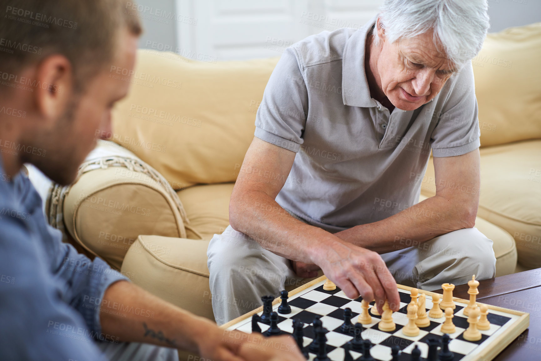 Buy stock photo Father, son and chess board game in home for mind development, strategy and match for bonding. Senior person, man and talent for moving piece in lounge, intelligence contest and brain challenge