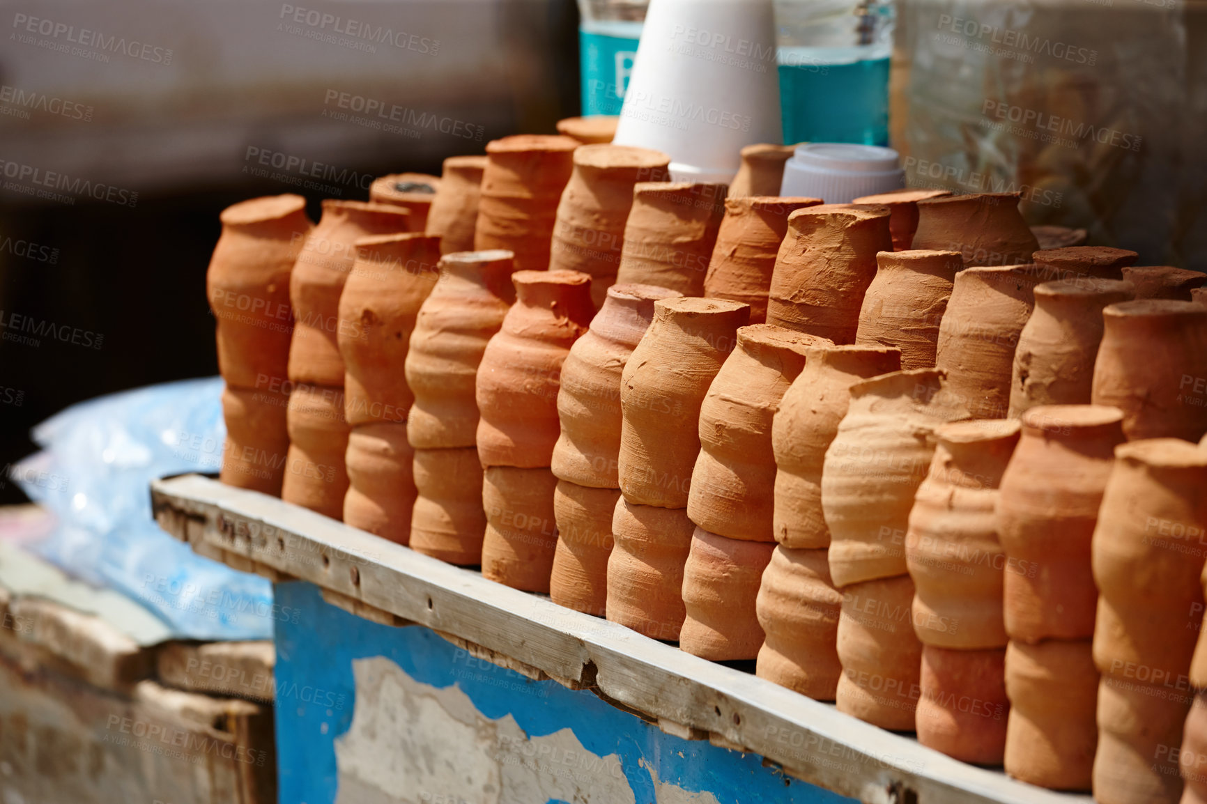 Buy stock photo Clay, market and Indian pots for cooking with ancient tradition, pottery and mud creation. Outdoor, travel and alkaline ceramic with craft, art and creative, homemade and handicraft in Mumbai