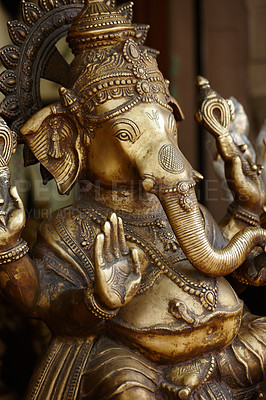 Buy stock photo Spiritual, sculpture and Indian religion with believe, faith and worship with hope. Empty, gold and art with history, Hindu god and philosophy with statue, temple and prayer with gratitude or tourism