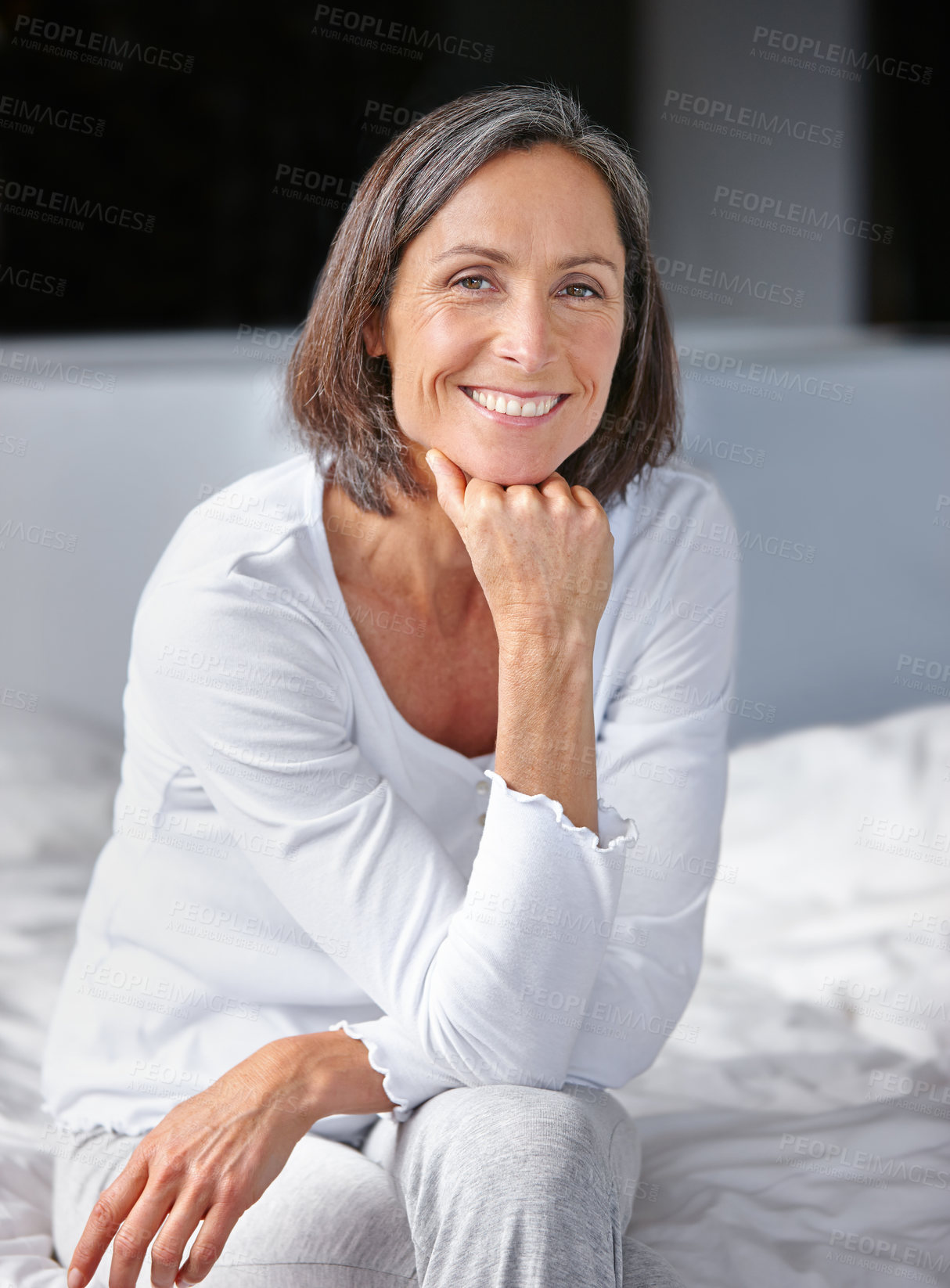 Buy stock photo Home, mature woman and happy in bed on portrait to relax, break and calm in Italy. Female person, apartment and satisfied in bedroom with memories, though and nostalgic in pajamas with positivity