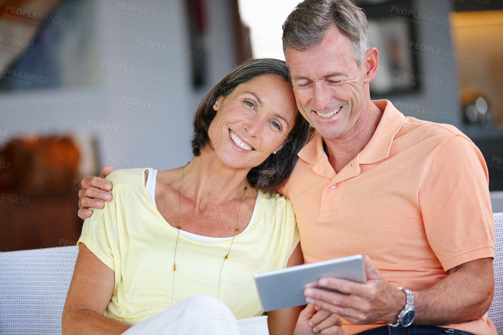 Buy stock photo Hug, mature couple and portrait with tablet for online joke, comedy film and streaming on website. Happy people, woman or man with digital subscription to watch movie, love or bonding on sofa at home