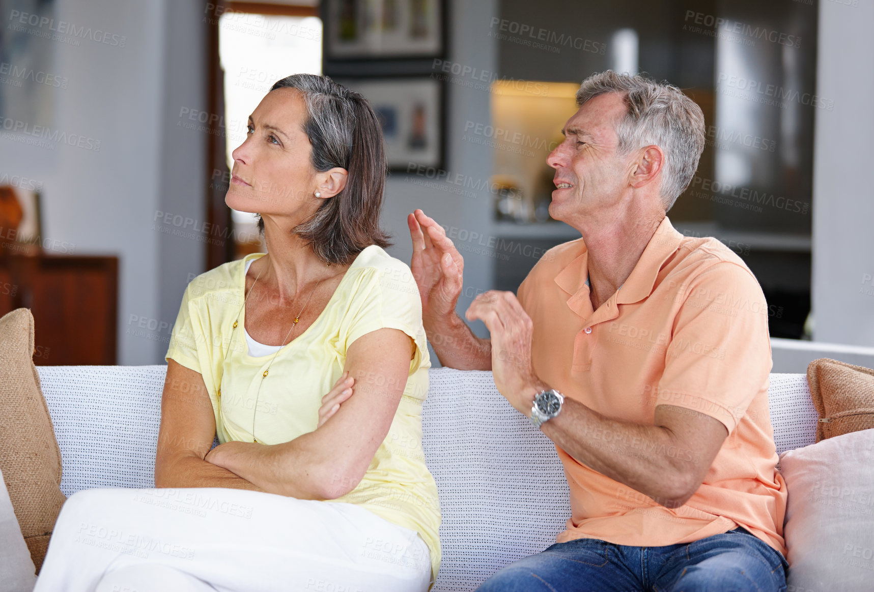 Buy stock photo Mature, frustrated couple and fight with argument on sofa for disagreement, divorce or breakup at home. Upset, man and woman with ignore for conflict, dispute or toxic relationship on couch at house