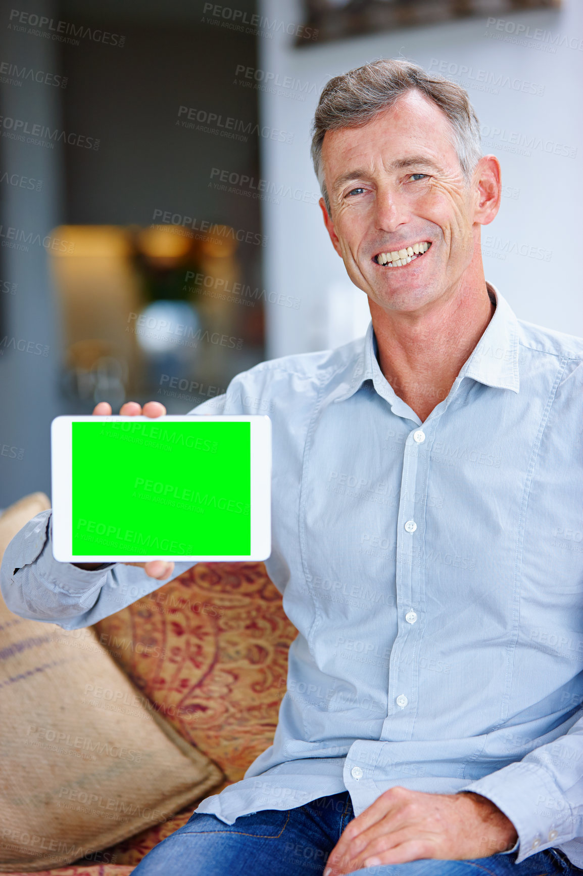 Buy stock photo Mature, portrait or happy man with green screen on tablet for advertising, marketing or app at home. Senior, male person or salesman with technology display or mockup space for user friendly UI or UX