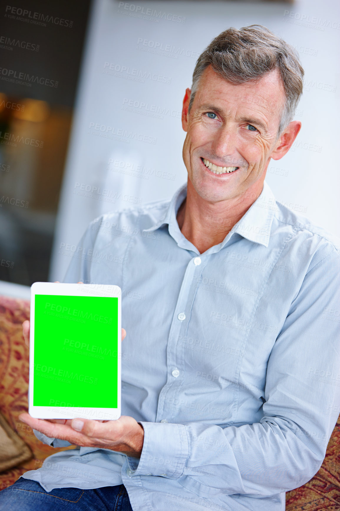 Buy stock photo Portrait, happy man and tablet with green screen or mockup for advertising or marketing online app at home. Mature, male person or salesman with technology display or space for user friendly UI or UX