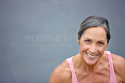 Buy stock photo Fitness, portrait and smile of mature woman outdoor for start of training routine for wellness. Exercise, face and mockup space with happy person on gray background from above for health workout