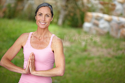 Buy stock photo Portrait of an attractive mature woman doing yoga outdoors