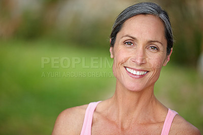 Buy stock photo Portrait of an attractive mature woman in gymwear standing outdoors