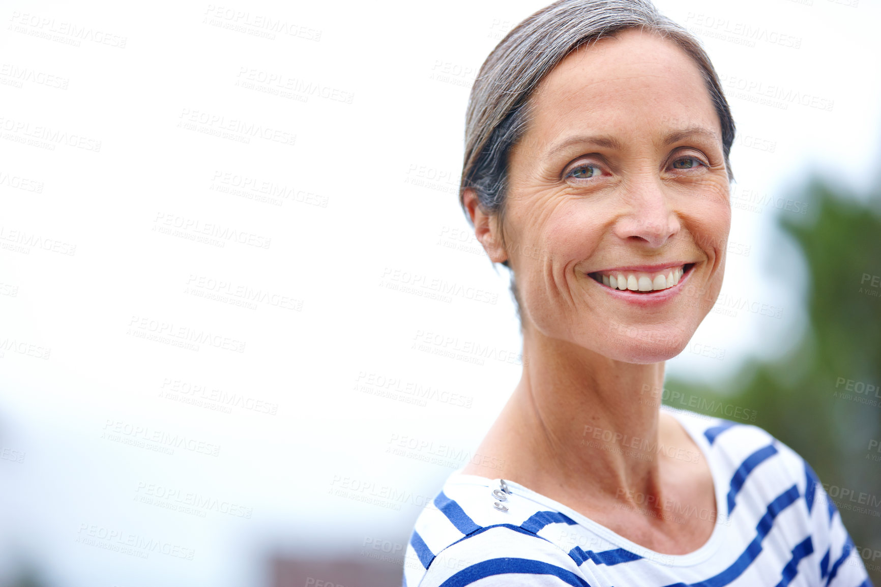 Buy stock photo Mature woman, portrait and outdoor on trip, peace and countryside for happiness in retirement. Female person, confidence and travel to woods to relax, space and vacation in forest of Switzerland