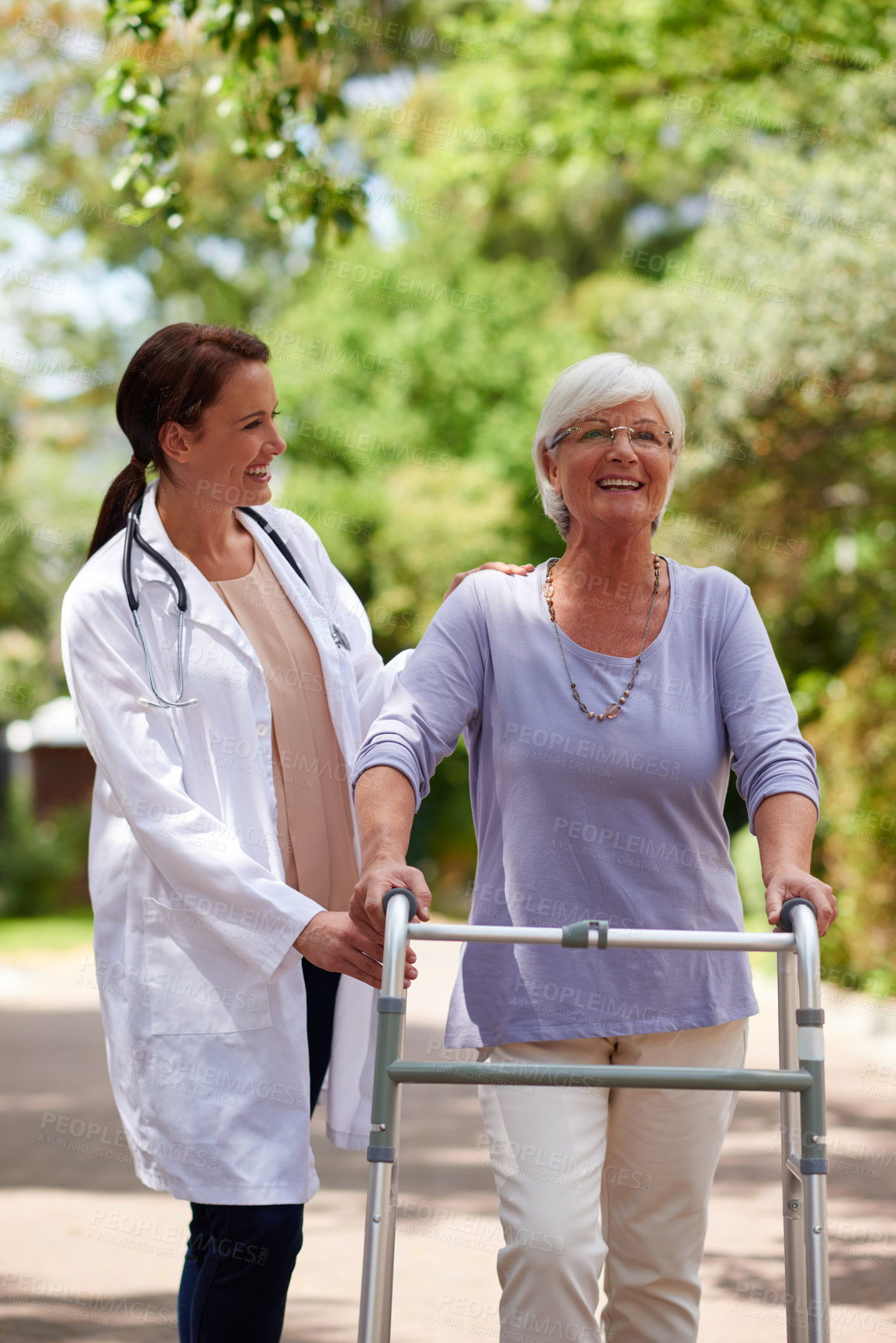 Buy stock photo Senior woman, doctor and walking stick for help outdoor of medical support, healthcare and treatment. Therapist, mobility and patient with disability of recovery, physical therapy and rehabilitation