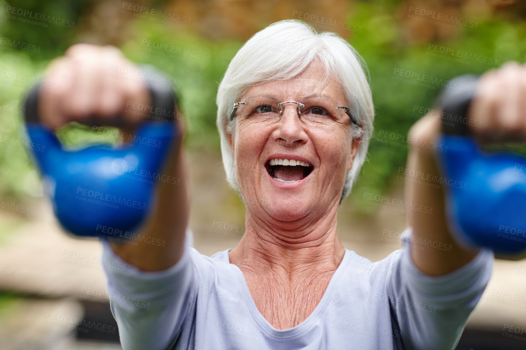 Buy stock photo Old woman, kettlebell and outdoor exercise in portrait, active and equipment for mobility. Female person, lift and fitness for joint flexibility in backyard of home, garden and weights for strength