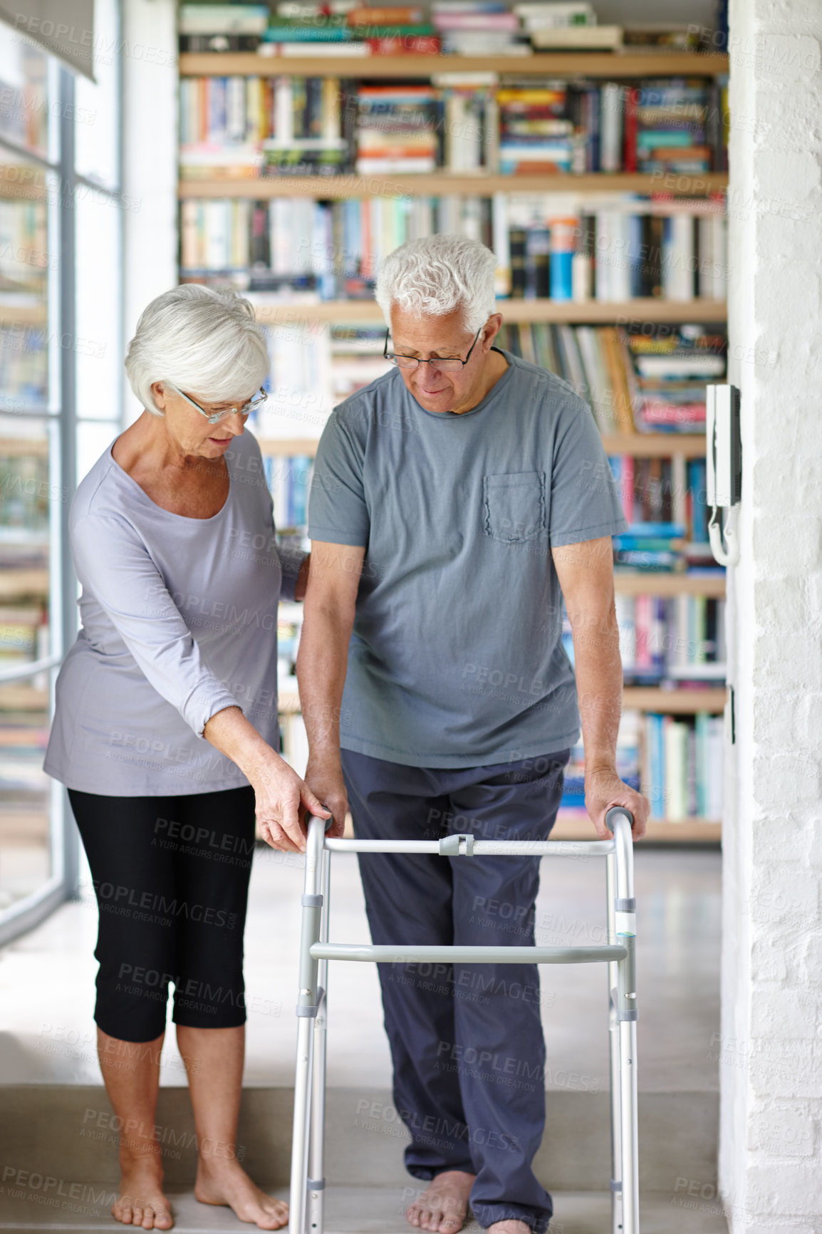 Buy stock photo Couple, walker and help senior man for support, love or care in home for health. Woman, walking frame or assistance of elderly person with disability in retirement, rehabilitation or physical therapy