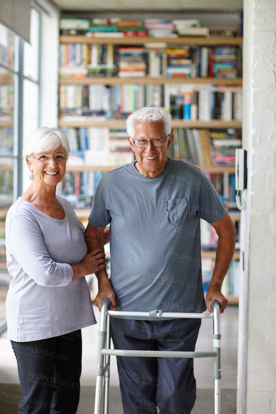 Buy stock photo Senior couple, smile and portrait with walker for support, help or care in home for health. Woman, walking frame and assist elderly man with disability in retirement, rehabilitation or physiotherapy