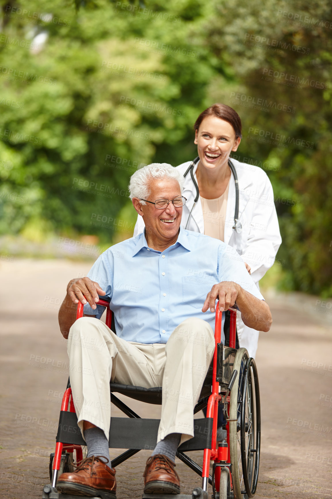 Buy stock photo Laughing, wheelchair or doctor with old man on road for healthcare support or break in park. Smile, senior patient or elderly person with a disability in outdoor nature for care, health or wellness