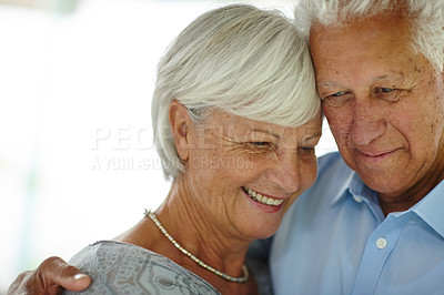 Buy stock photo Happy, hug and senior couple in home for bonding, love and relationship together for commitment. Retirement, marriage and elderly man and woman embrace for affection, care and support in house