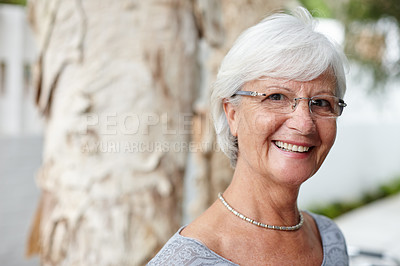 Buy stock photo Portrait of a senior woman smiling