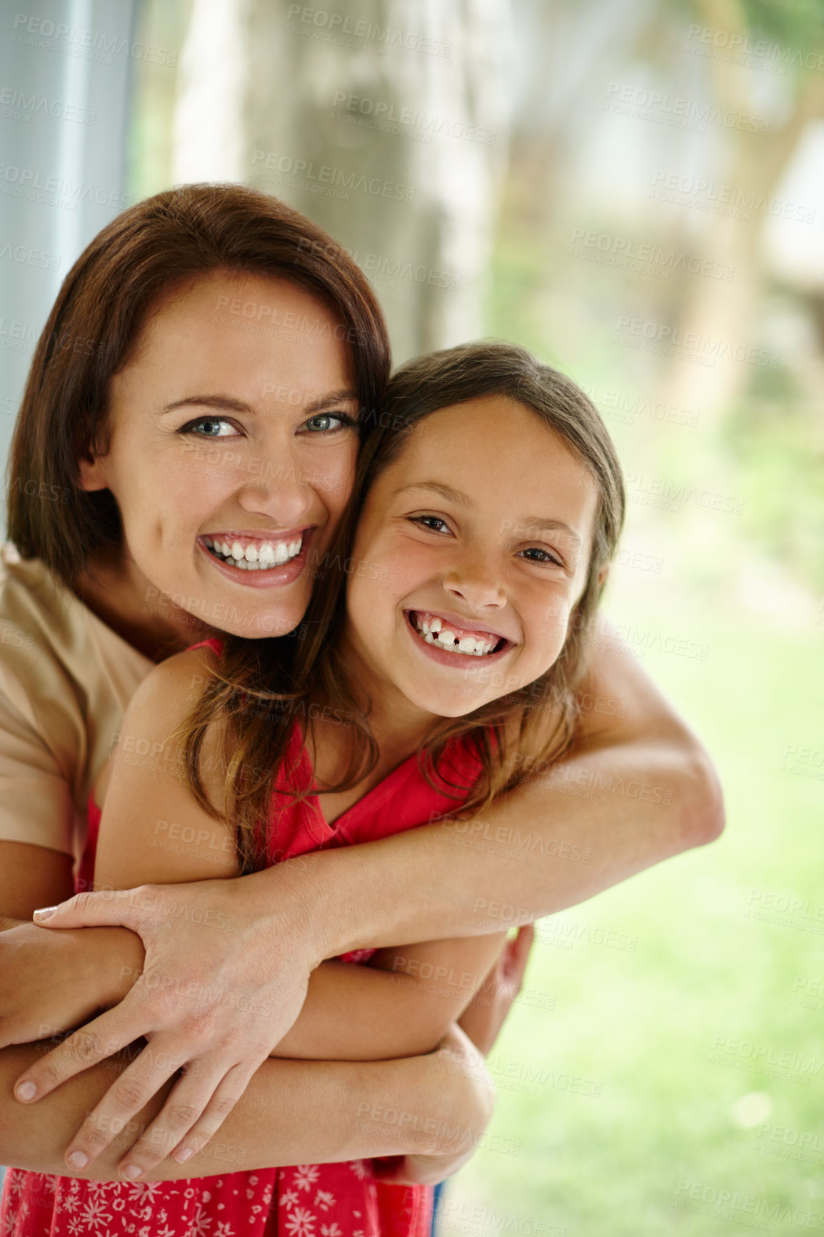 Buy stock photo Mother, portrait and daughter hug in home, support and security in childhood relationship. Happy people, mama and child together for bonding in living room, trust and care for family in embrace