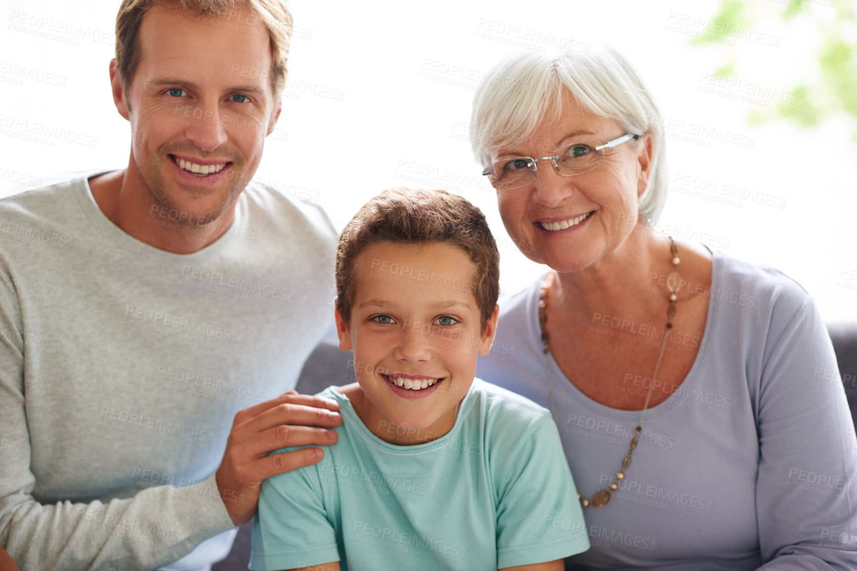 Buy stock photo Sofa, grandmother and father with child in portrait, bonding together and embrace relationship at home. Happy family, grandma and dad with boy for relax, love and connection with trust in house