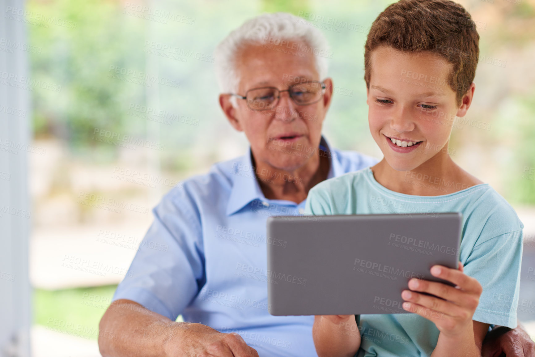 Buy stock photo Grandfather, kid and tablet for ebook in home, love and weekend visit for fun online. Grandpa, grandchild and streaming video on internet for bonding, watching together and playing on website or app