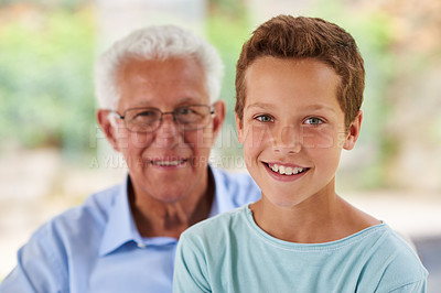 Buy stock photo Shot of a grandfather and grandson enjoying spending time together 