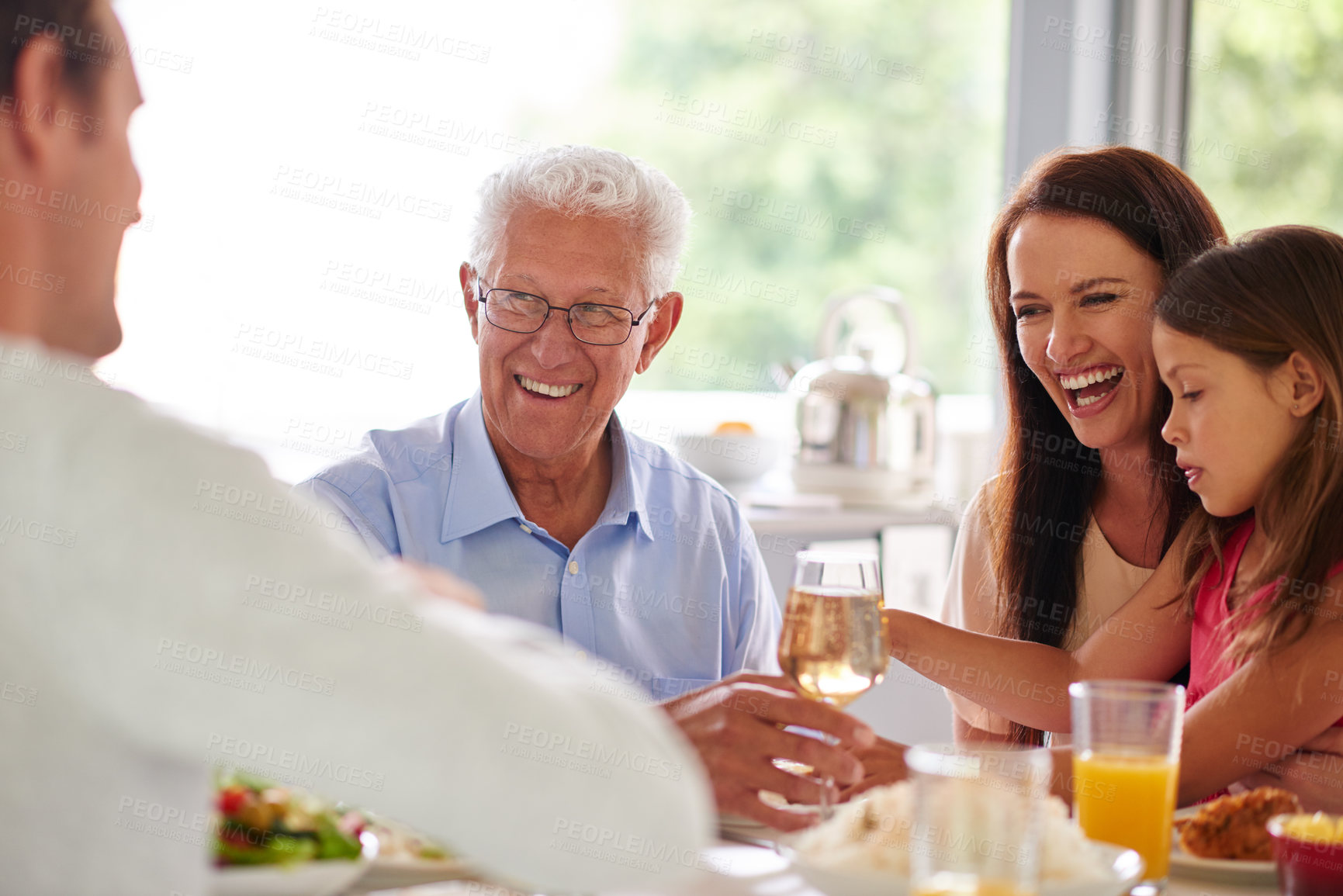 Buy stock photo Happy, family and people at lunch in home for bonding at feast, festive celebration and holiday. Thanksgiving, Christmas and grandpa, mom and girl with food for party, supper and eating together