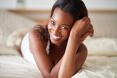 Buy stock photo Portrait, black woman and smile on bed, relax and wake up in morning of weekend, break and confident. Bedroom, happy and person comfortable on mattress, cheerful and peace in house of girl in USA