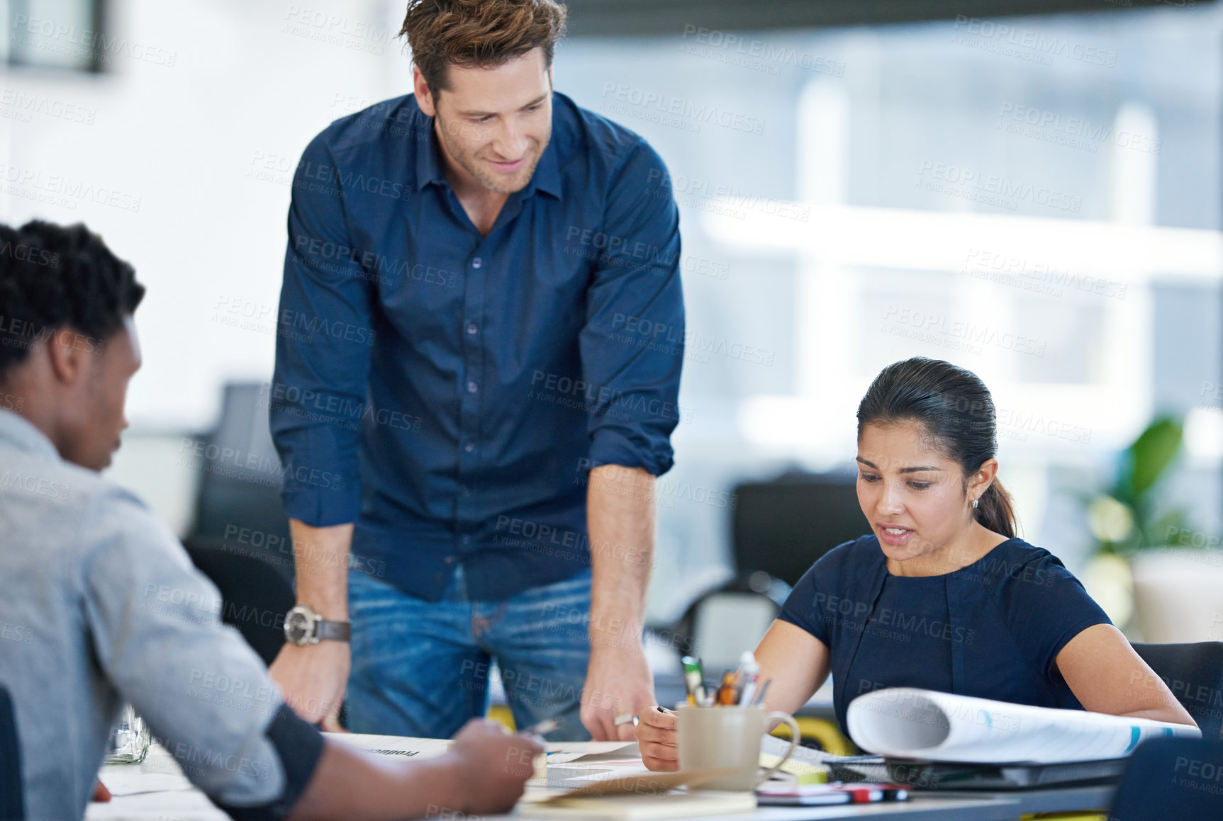 Buy stock photo Shot of a group of young designers working together in an office