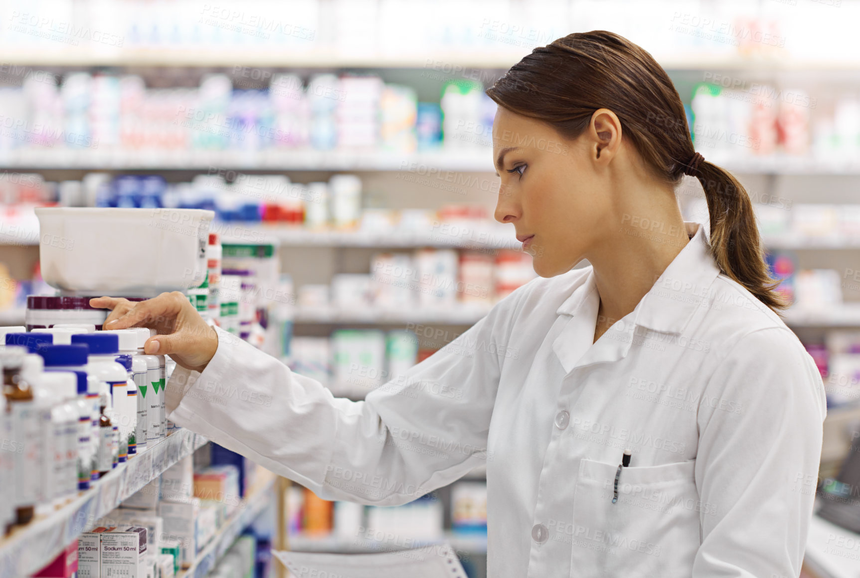 Buy stock photo Pharmacy, stock and woman for healthcare with prescription for information, medicine and wellness. Drugs, pharmacist and inventory with pills, medication and search at chemist for retail supplements