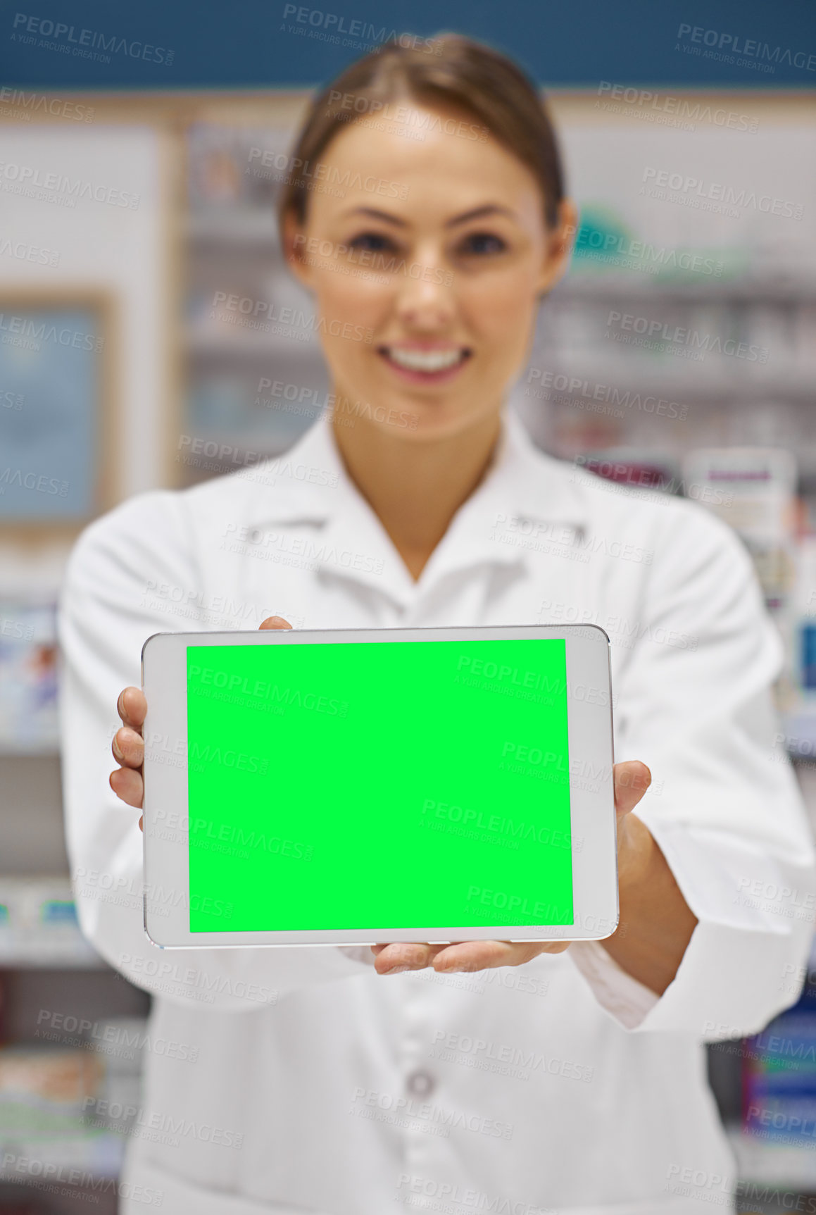 Buy stock photo Portrait of an attractive pharmacist holding up a blank digital tablet display