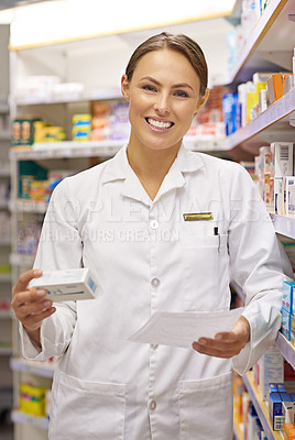 Buy stock photo Portrait of an attractive young pharmacist collecting a prescription in an aisle