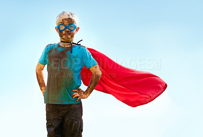 Buy stock photo Portrait, confident and superhero child outdoor with wind on cape, goggles and mockup on blue sky in summer. Blonde boy, kid and hero in costume in dirty clothes, mud and messy for fantasy in Sweden