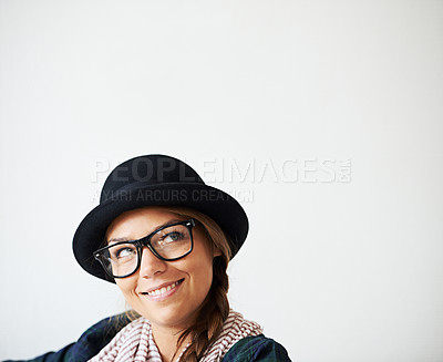 Buy stock photo Thinking, smile and a woman on a studio background for knowledge, fashion or vision care. Happy, idea and a young girl with mockup space, eyewear and planning style, cool or a trendy hipster