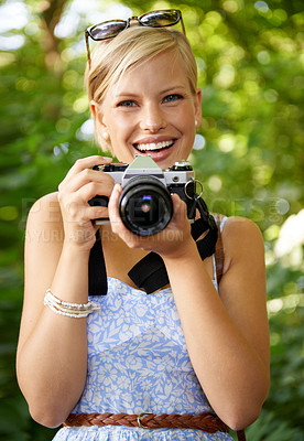 Buy stock photo Portrait, camera lens and photographer with woman in forest for smile, memory and photography. Summer, happy and adventure with person and shooting for vacation, holiday and environmental tourism