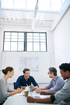 Buy stock photo Shot of a business meeting on the go