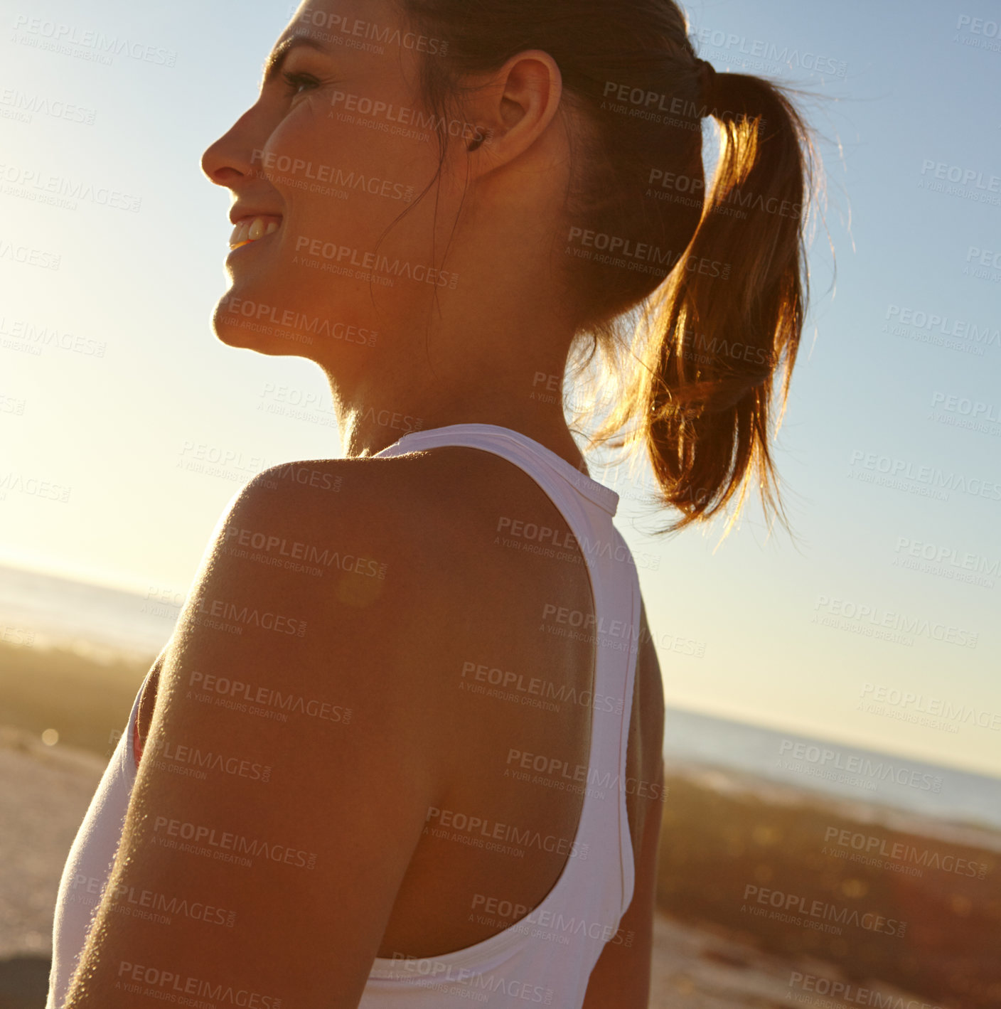 Buy stock photo Profile shot of a beautiful woman in sportswear admiring the view