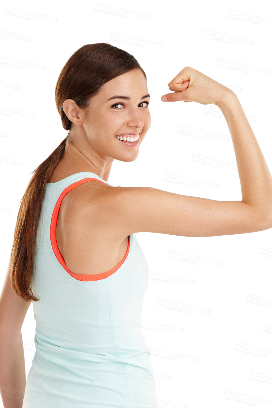 Buy stock photo Shot of a beautiful young woman flexing her muscles