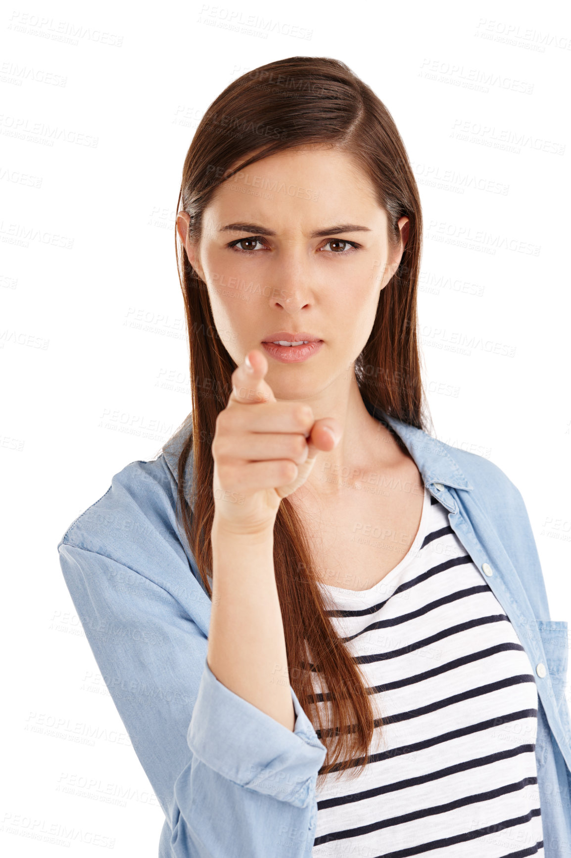 Buy stock photo Studio shot of a beautiful young woman pointing her finger in anger against a white background 