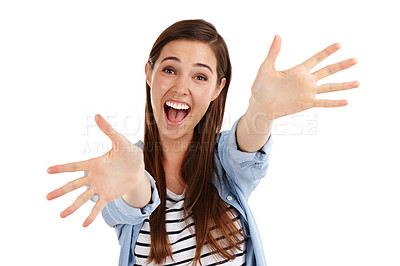 Buy stock photo Studio shot of a beautiful young woman holding her hands out against a white background 