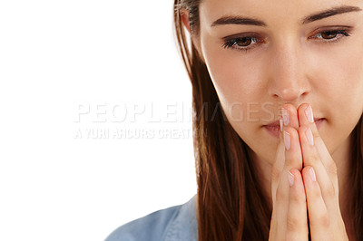 Buy stock photo Studio shot of a beautiful young woman with her hands together in anticipation against a white background