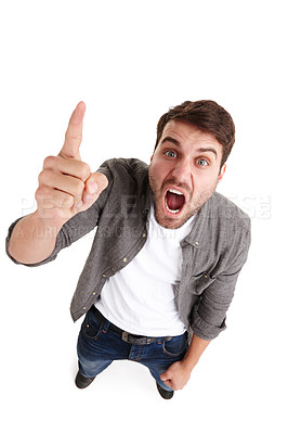 Buy stock photo High-angle portrait of an angry young man in studio shaking his finger and shouting