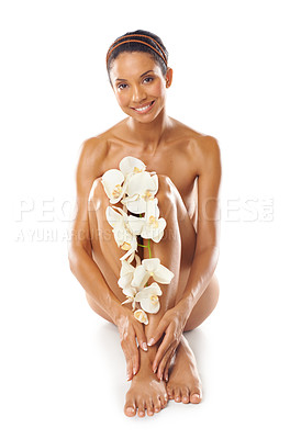 Buy stock photo Skincare, portrait and beauty of woman with flowers in studio on a white background mock up. Floral cosmetics, organic makeup and female model with orchids on legs for skin treatment and body care.