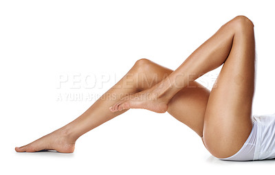 Buy stock photo Skincare, cleaning and legs of woman on a white background for shaving, grooming and body hygiene. Wellness, beauty and feet of girl isolated in studio for laser treatment, cosmetics and hair removal